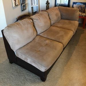 Brown suede couch with darker leather trim